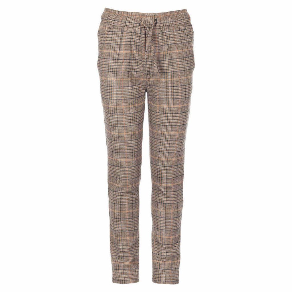 a pair of smart pants with a matching brown blouse